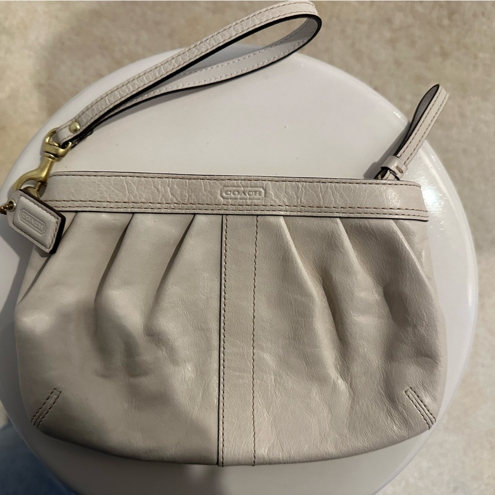 Coach cream wristlet